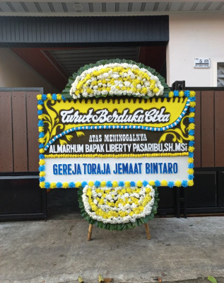 Papan Bunga Duka di Manado